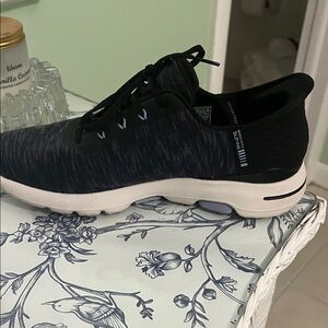 Skechers Blackish dark gray and  White slip on golf shoes. Super comfortable
